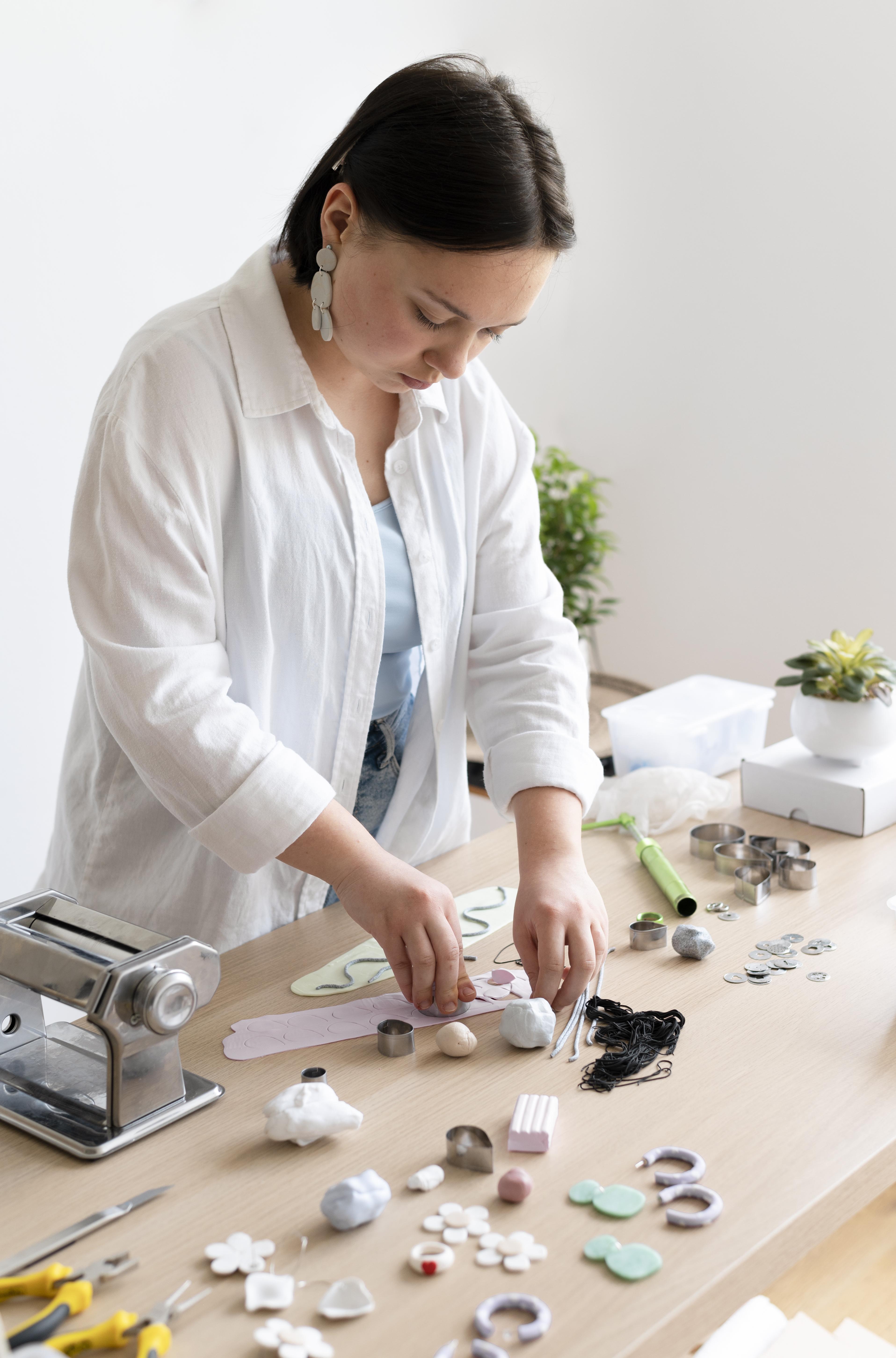female-artisan-working-atelier-with-clay.jpg